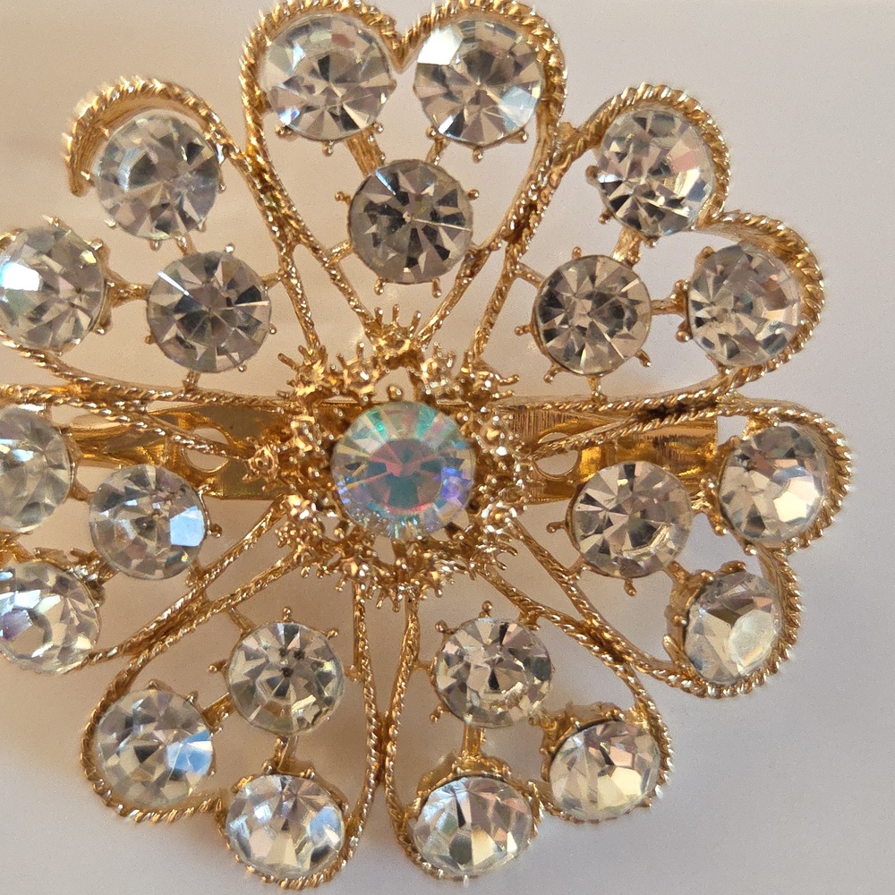 Gold Floral Crystal Brooch with Iridescent Center